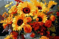 Букет подсолнухов в вазе на столе